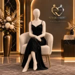 Black bodycon gown with delicate rhinestone detailing and elegant ruched bodice