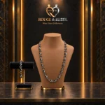 A black faceted bead necklace with silver-tone accents and a matching bracelet